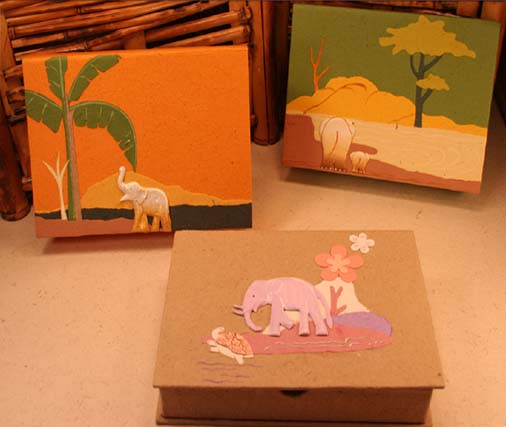 Mr. Ellie Pooh makes products such as photo albums out of elephant dung.
